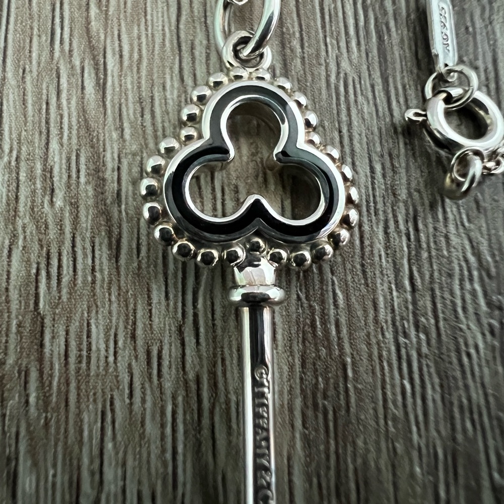 Tiffany & Co. black enamel outline trefoil key necklace